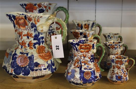 Graduated set of eight mostly Masons ironstone octagonal jugs 8cm to 24cm